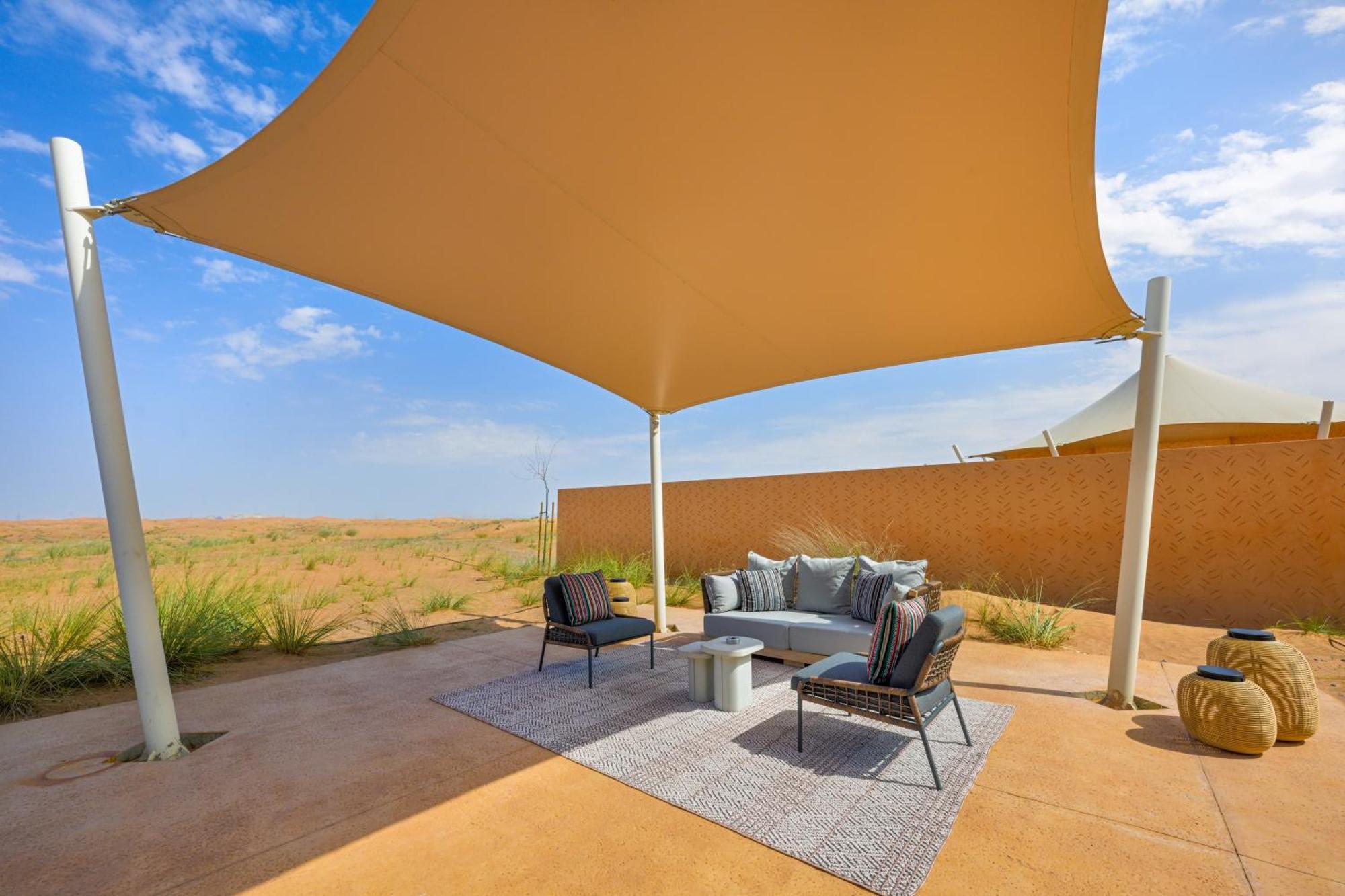 Mysk Al Badayer Retreat Hotel Margham Eksteriør billede A shade sail at the Al Maha Desert Resort, Dubai